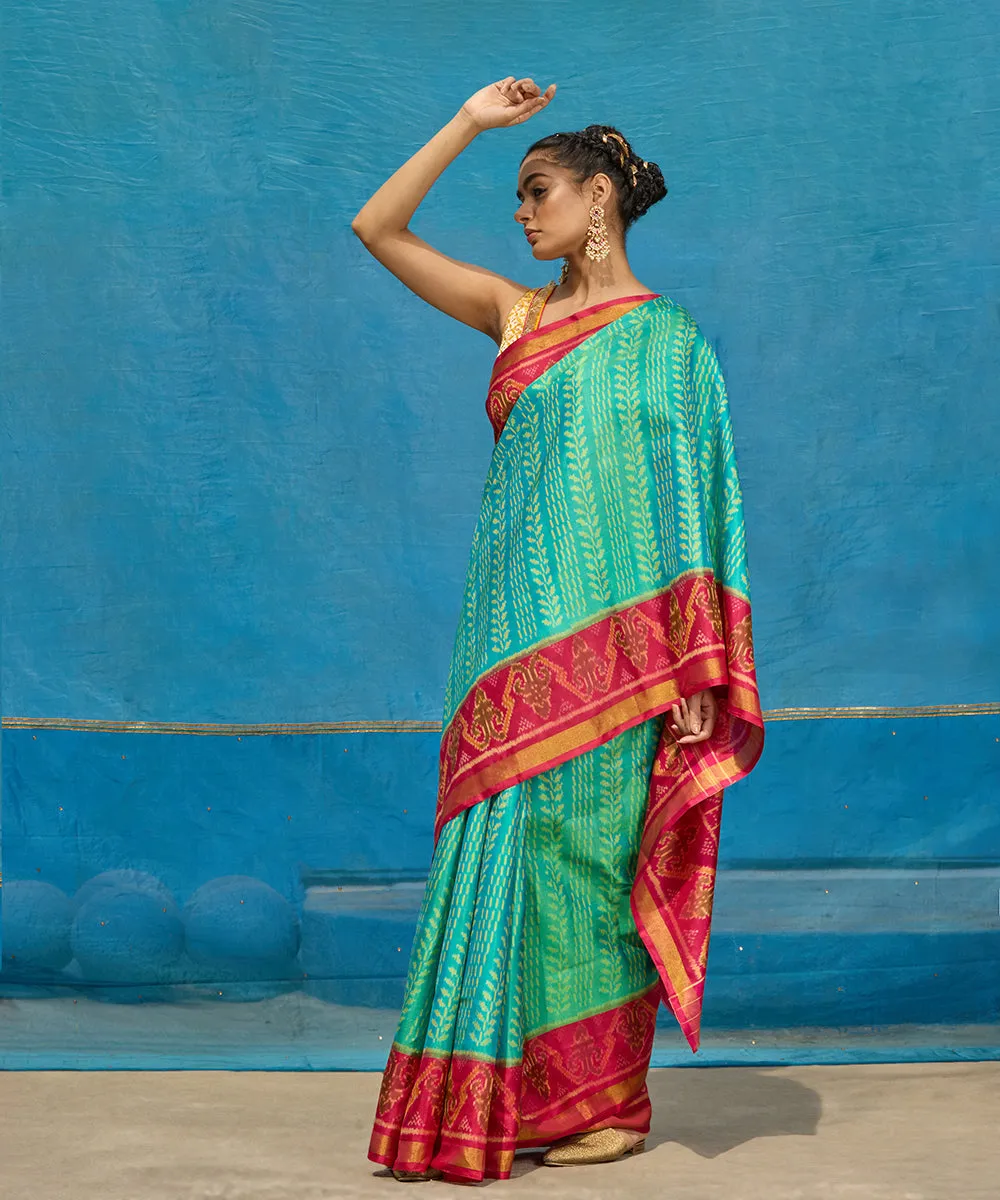 Handloom Aqua Blue Pure Mulberry Silk Ikat Patola Saree With Pink Border And Palla