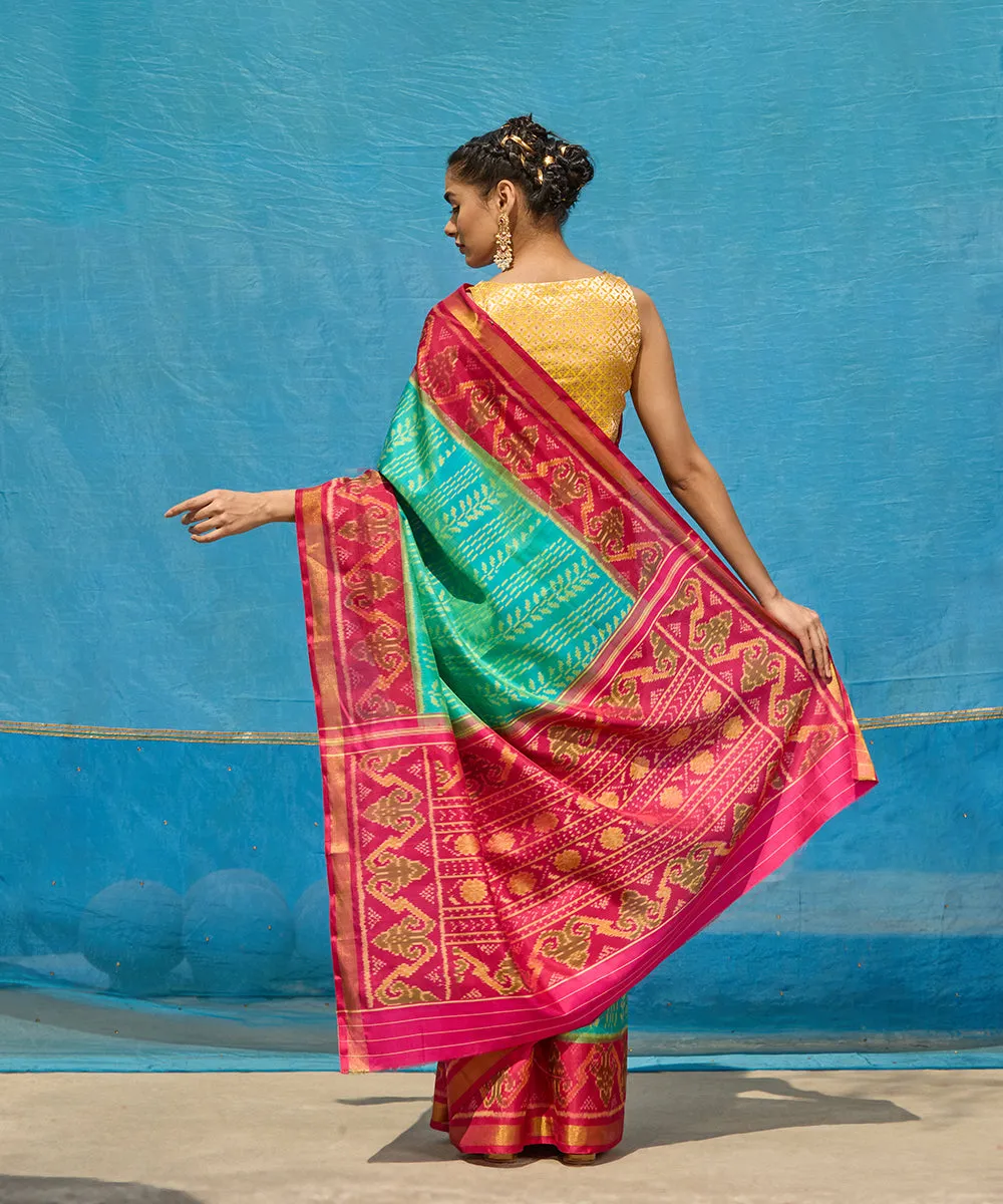 Handloom Aqua Blue Pure Mulberry Silk Ikat Patola Saree With Pink Border And Palla